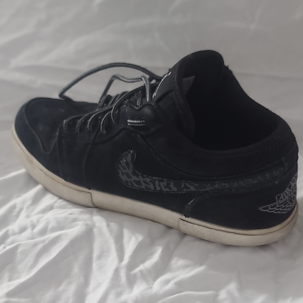 Jordan Black and White Sneakers with Lace-Up Design and Textured Upper